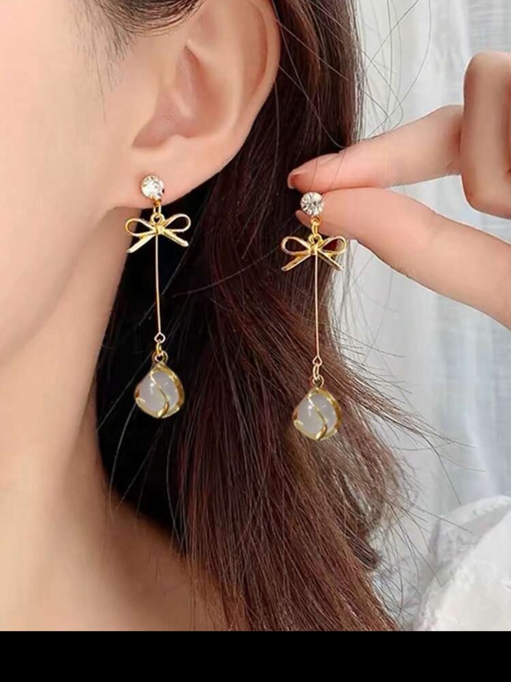 Gold Bow Drop Earrings with White Teardrop